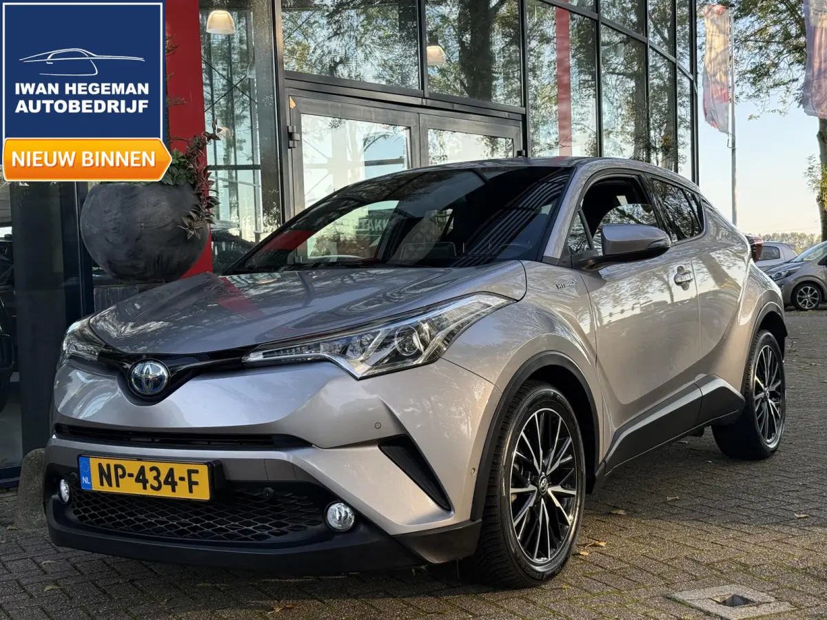 1.8 Hybrid Executive | Navigatie | Climate Control | Stoelverwarming | Cruise Control | Licht metalen velgen