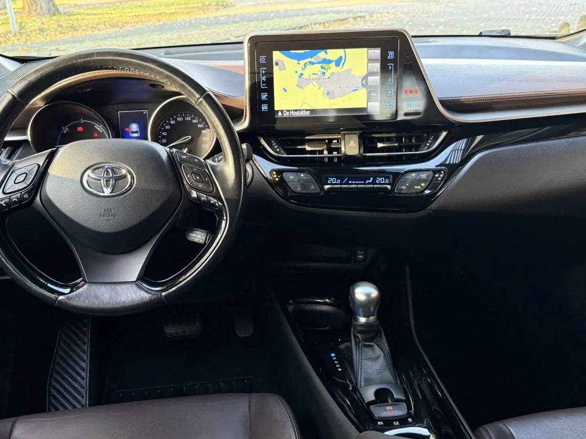 1.8 Hybrid Executive | Navigatie | Climate Control | Stoelverwarming | Cruise Control | Licht metalen velgen