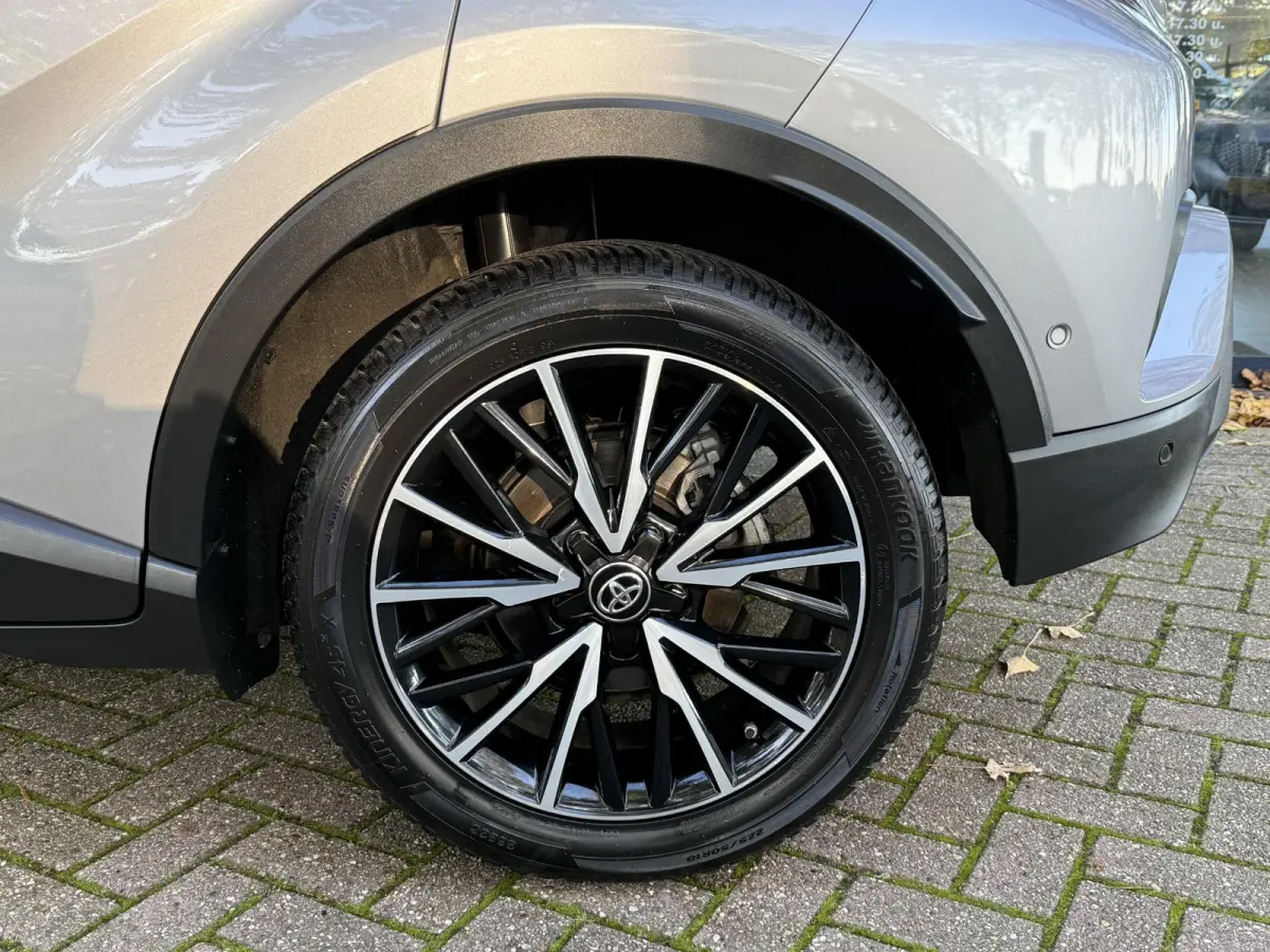 1.8 Hybrid Executive | Navigatie | Climate Control | Stoelverwarming | Cruise Control | Licht metalen velgen