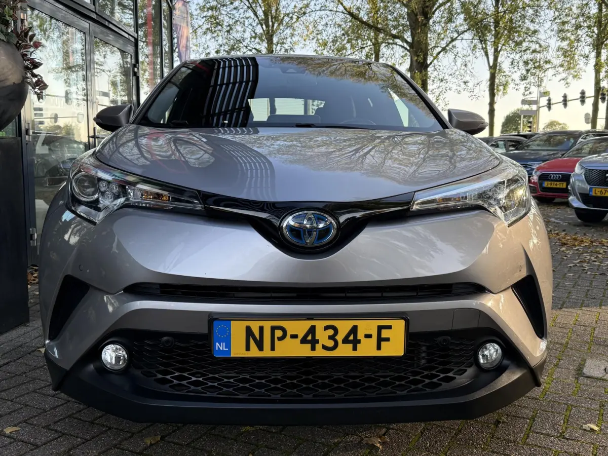 1.8 Hybrid Executive | Navigatie | Climate Control | Stoelverwarming | Cruise Control | Licht metalen velgen