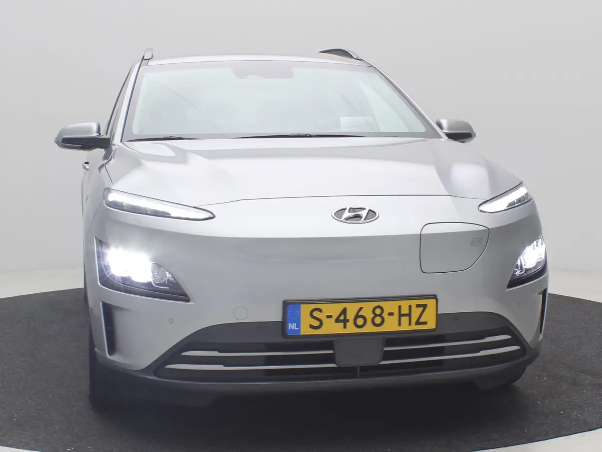 EV Premium 64 kWh SOH 100% / 1ste eigenaar | Achterbank verwarmd | Achteruitrijcamera | Apple Carplay/Android Auto|telefoonintegratie premium