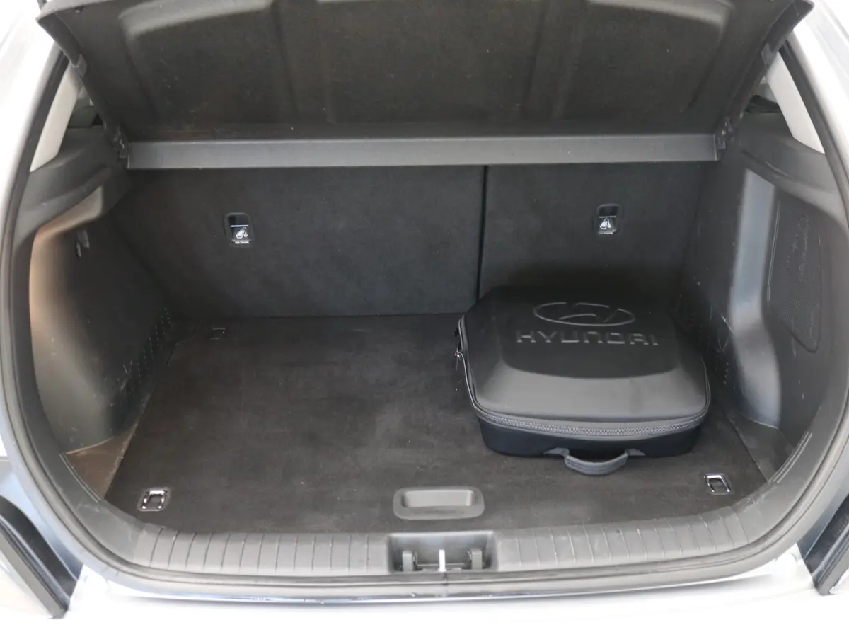 EV Premium 64 kWh SOH 100% / 1ste eigenaar | Achterbank verwarmd | Achteruitrijcamera | Apple Carplay/Android Auto|telefoonintegratie premium