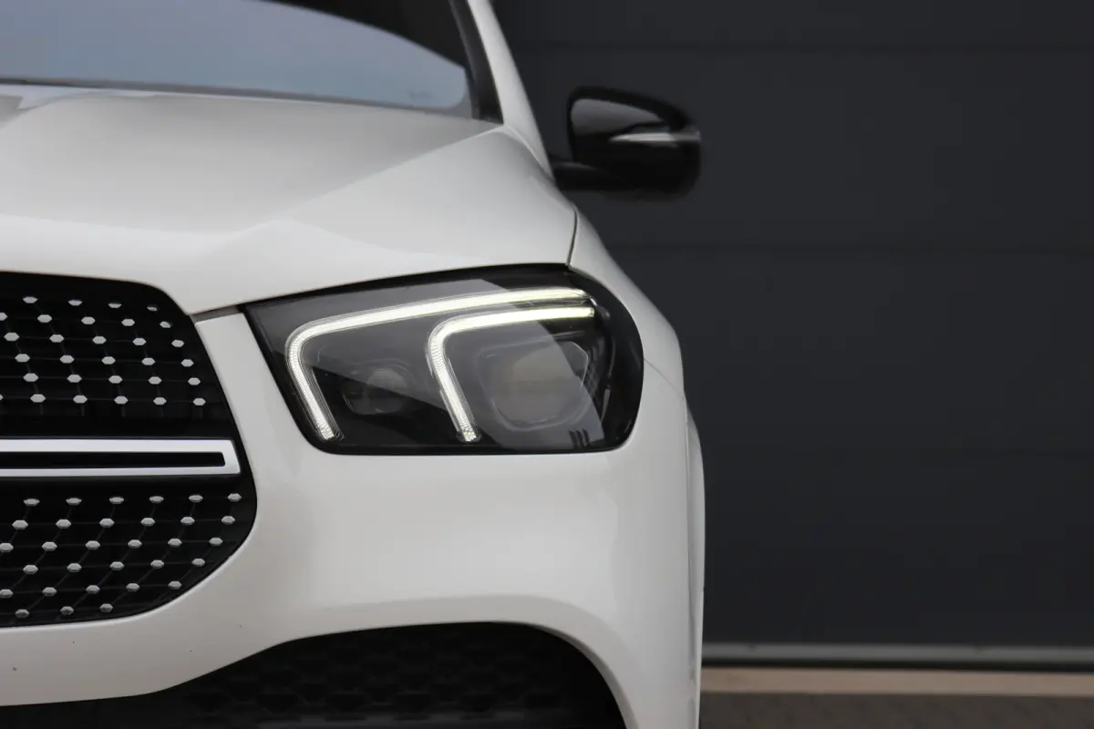 350 de 4MATIC AMG Line | Luchtvering | Distronic+ | HUD | Burmester | Trekhaak | Panoramadak | Surround Camera | Keyless Go | Augmented Reality |
