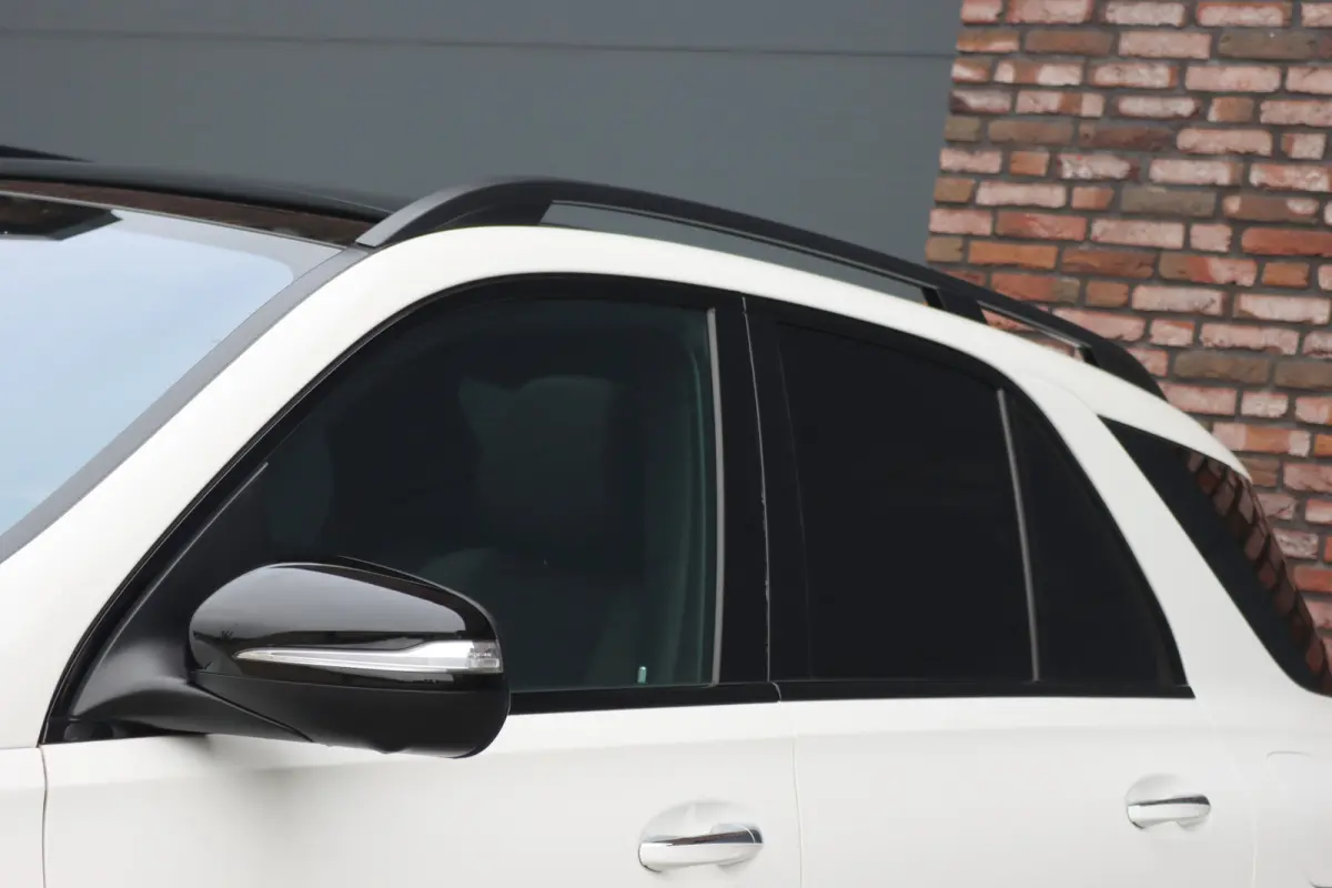 350 de 4MATIC AMG Line | Luchtvering | Distronic+ | HUD | Burmester | Trekhaak | Panoramadak | Surround Camera | Keyless Go | Augmented Reality |