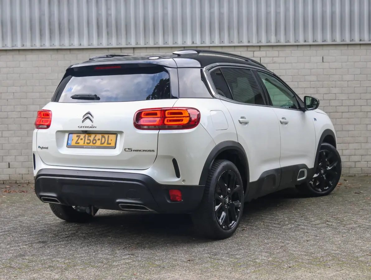 1.6 225pk Hybrid Shine | Accutest 93% | Elektrisch verstelbare stoel | Automatische Achterklep | Camera voor en achter | Navigatie