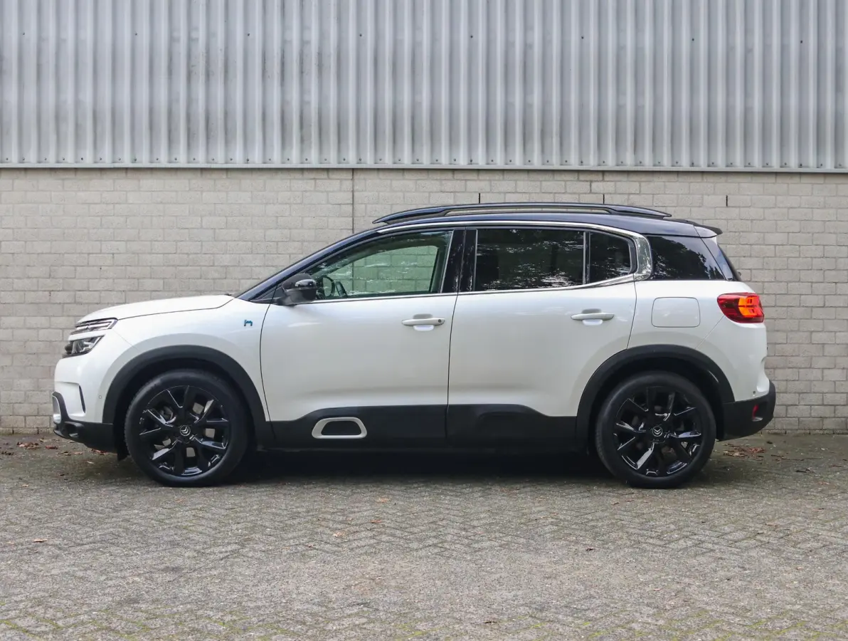 1.6 225pk Hybrid Shine | Accutest 93% | Elektrisch verstelbare stoel | Automatische Achterklep | Camera voor en achter | Navigatie