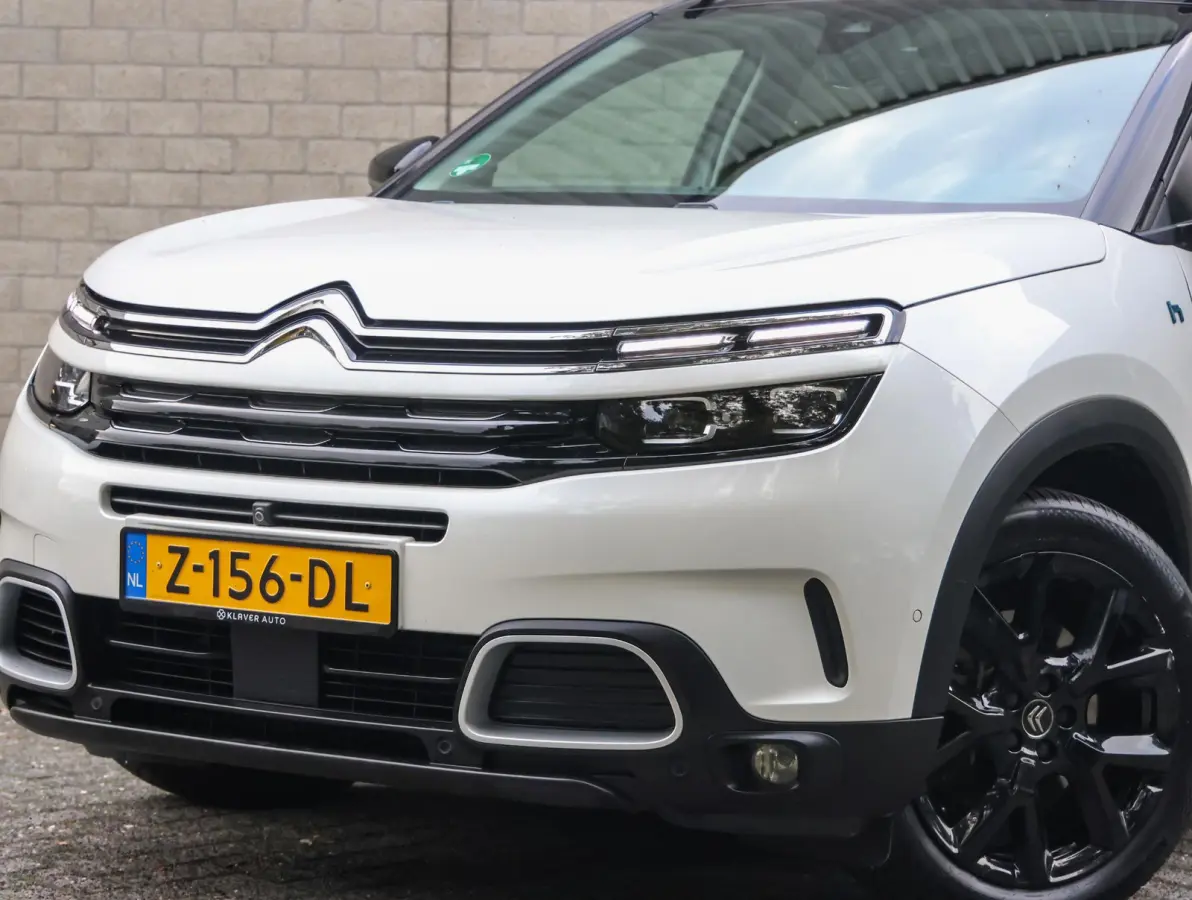 1.6 225pk Hybrid Shine | Accutest 93% | Elektrisch verstelbare stoel | Automatische Achterklep | Camera voor en achter | Navigatie