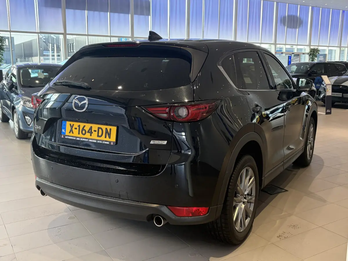 2.5 SkyActiv-G 194 GT-M | HEAD UP DISPLAY | VOORUITRIJCAMERA | ACHTERUITRIJCAMERA | ELEKTRISCH BEDIENBARE ACHTERKLEP |