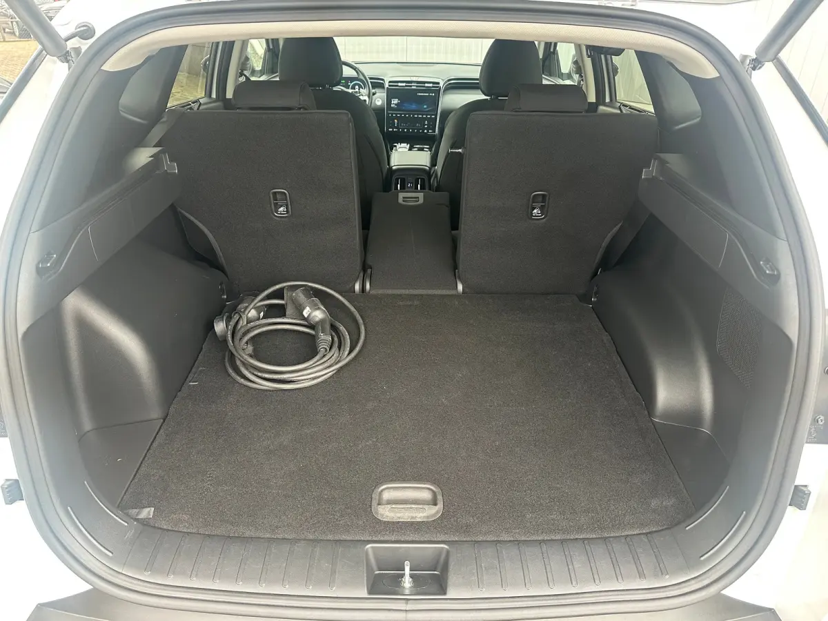 1.6 T-GDI 265pk PHEV Comfort Smart 4WD | Climate | Camera | Carplay | Keyless | Navigatie | Full - Led | Elek. Klep | Winterpakket | 19" Lichtmetaal | Krell Audio | Digitale Cockpit | Parkee