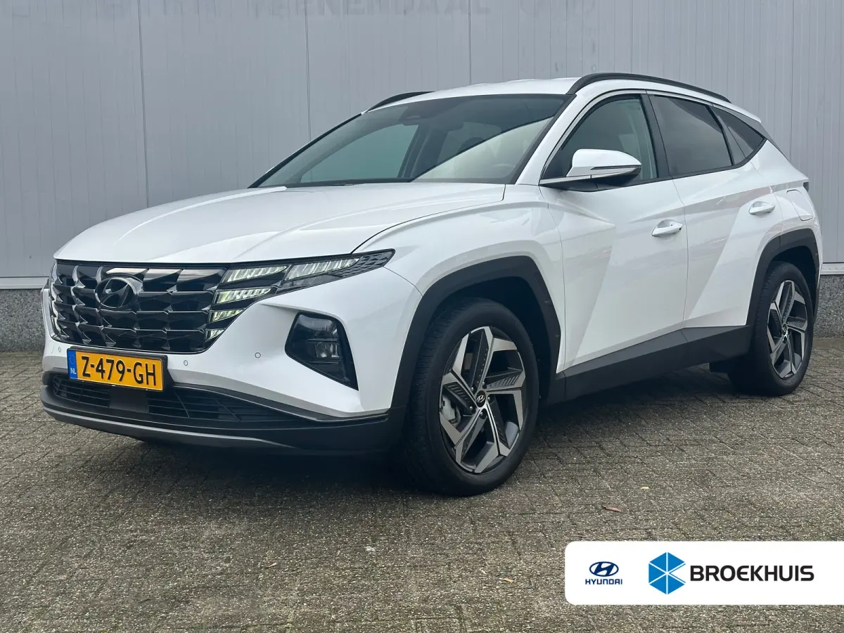 1.6 T-GDI 265pk PHEV Comfort Smart 4WD | Climate | Camera | Carplay | Keyless | Navigatie | Full - Led | Elek. Klep | Winterpakket | 19" Lichtmetaal | Krell Audio | Digitale Cockpit | Parkee