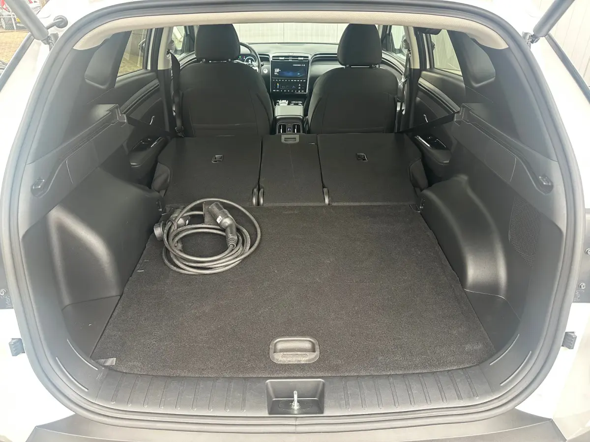 1.6 T-GDI 265pk PHEV Comfort Smart 4WD | Climate | Camera | Carplay | Keyless | Navigatie | Full - Led | Elek. Klep | Winterpakket | 19" Lichtmetaal | Krell Audio | Digitale Cockpit | Parkee