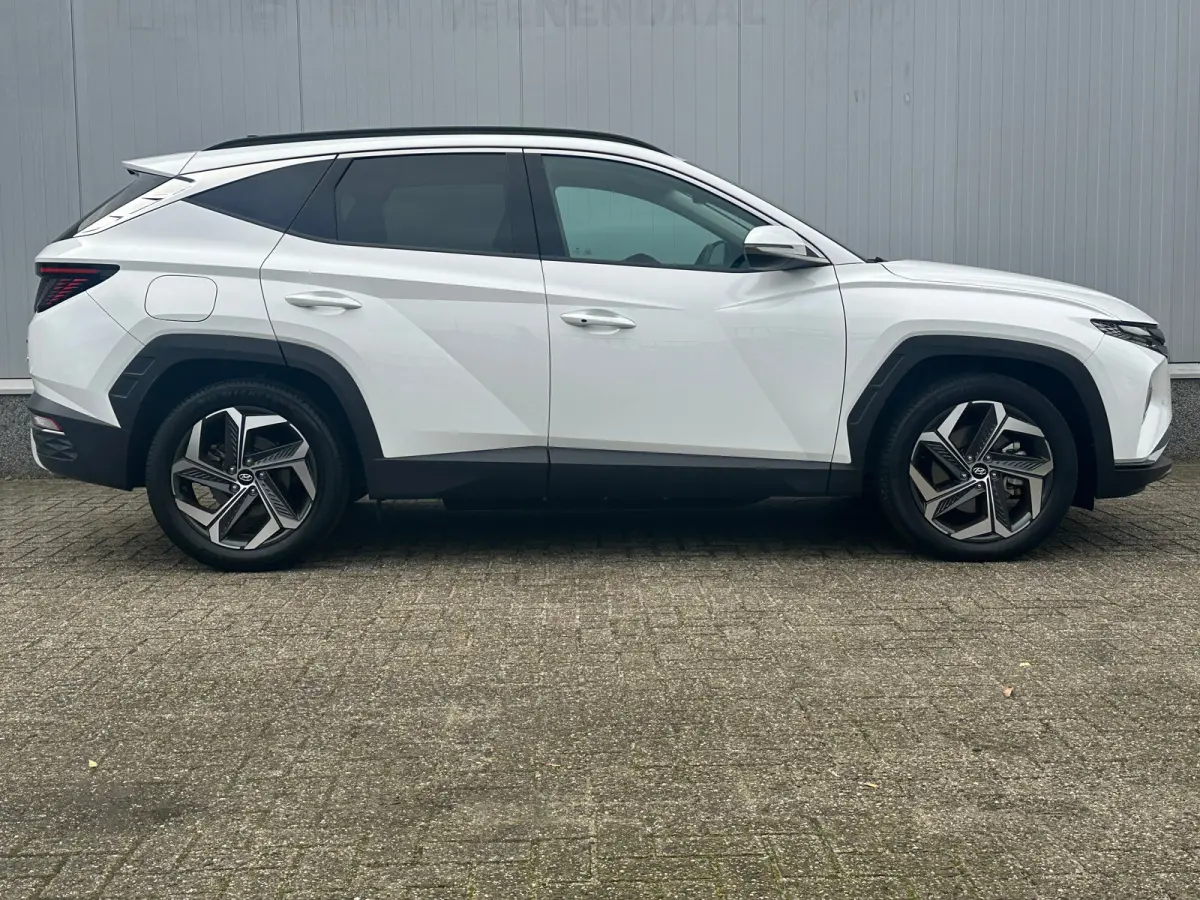1.6 T-GDI 265pk PHEV Comfort Smart 4WD | Climate | Camera | Carplay | Keyless | Navigatie | Full - Led | Elek. Klep | Winterpakket | 19" Lichtmetaal | Krell Audio | Digitale Cockpit | Parkee