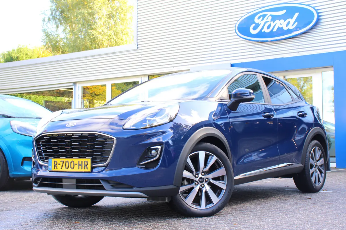 1.0EB Titanium X | NL-AUTO! | 1E EIGENAAR! | CRUISE | LANE ASSIST | NAVI | CLIMA | PARK SENS | DEALER OH! | APPLE CARPLAY/ANDROID AUTO