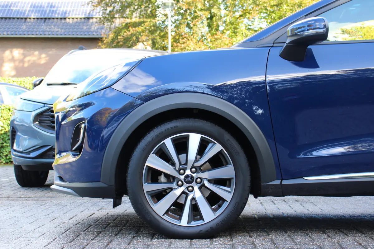 1.0EB Titanium X | NL-AUTO! | 1E EIGENAAR! | CRUISE | LANE ASSIST | NAVI | CLIMA | PARK SENS | DEALER OH! | APPLE CARPLAY/ANDROID AUTO