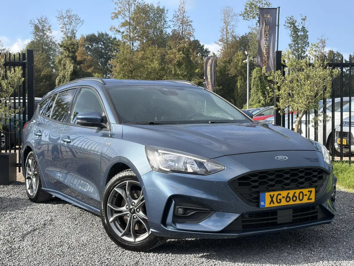 1.0 EcoBoost ST Line Business ✓2e Eigenaar✓Navi✓Camera✓Carplay✓Afn.Trekhaak✓125pk✓Keyless✓Stoelverw✓Stuurverw✓6 Bak✓Dealer Onderhouden✓17'' Lm velgen✓Pdc V+A✓N.A.
