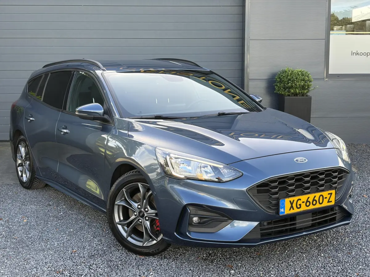 1.0 EcoBoost ST Line Business ✓2e Eigenaar✓Navi✓Camera✓Carplay✓Afn.Trekhaak✓125pk✓Keyless✓Stoelverw✓Stuurverw✓6 Bak✓Dealer Onderhouden✓17'' Lm velgen✓Pdc V+A✓N.A.