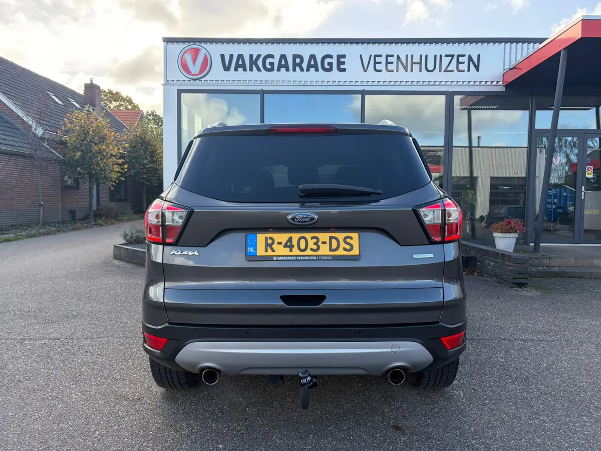 1.5 EcoBoost Titanium|Rijklaar prijs|Trekhaak|Elek. klep|Sensoren|Carplay|