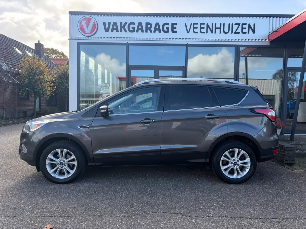1.5 EcoBoost Titanium|Rijklaar prijs|Trekhaak|Elek. klep|Sensoren|Carplay|