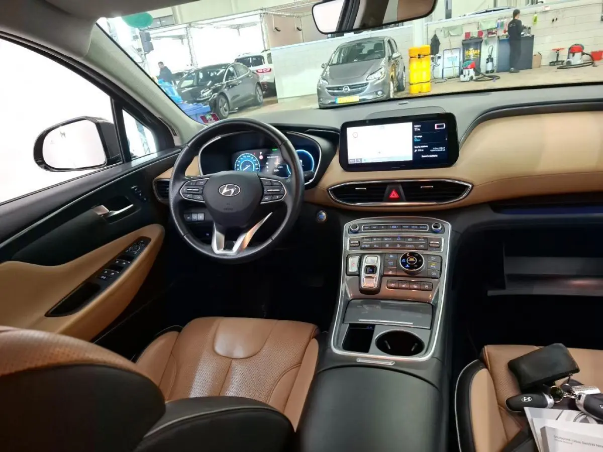 1.6 T-GDI PHEV PREMIUM 7-PERS (100% SOH) I AUTOMAAT I TREKHAAK I ADAPTIVE CRUISE CONTROL I LEDEREN BEKLEDING