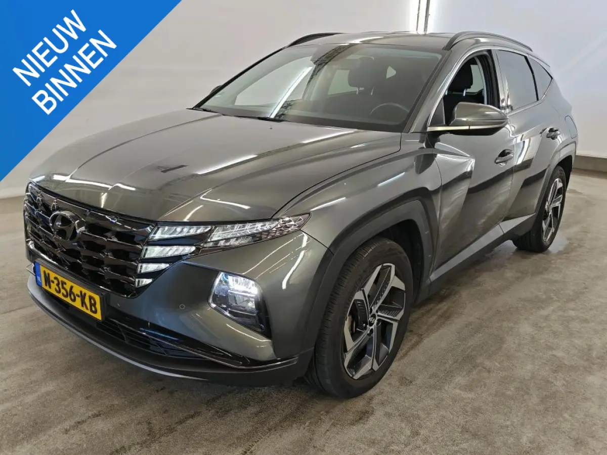 1.6 T-GDI PHEV COMFORT SMART 4WD (93% SOH) I AUTOMAAT I TREKHAAK I P-CAMERA I CLIMATE CONTROL I ADAPTIVE CRUISE CONTROL