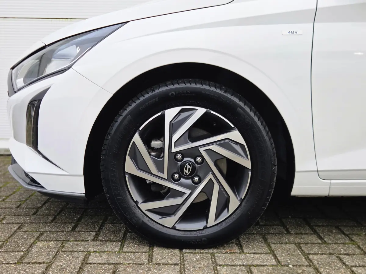 1.0 T-GDI 100pk Comfort | Airco | Camera | Carplay | Cruise control | Dodehoek detectie | Navigatie | Parkeersensoren | Digitaal cockpit | Lichtmetalen velgen