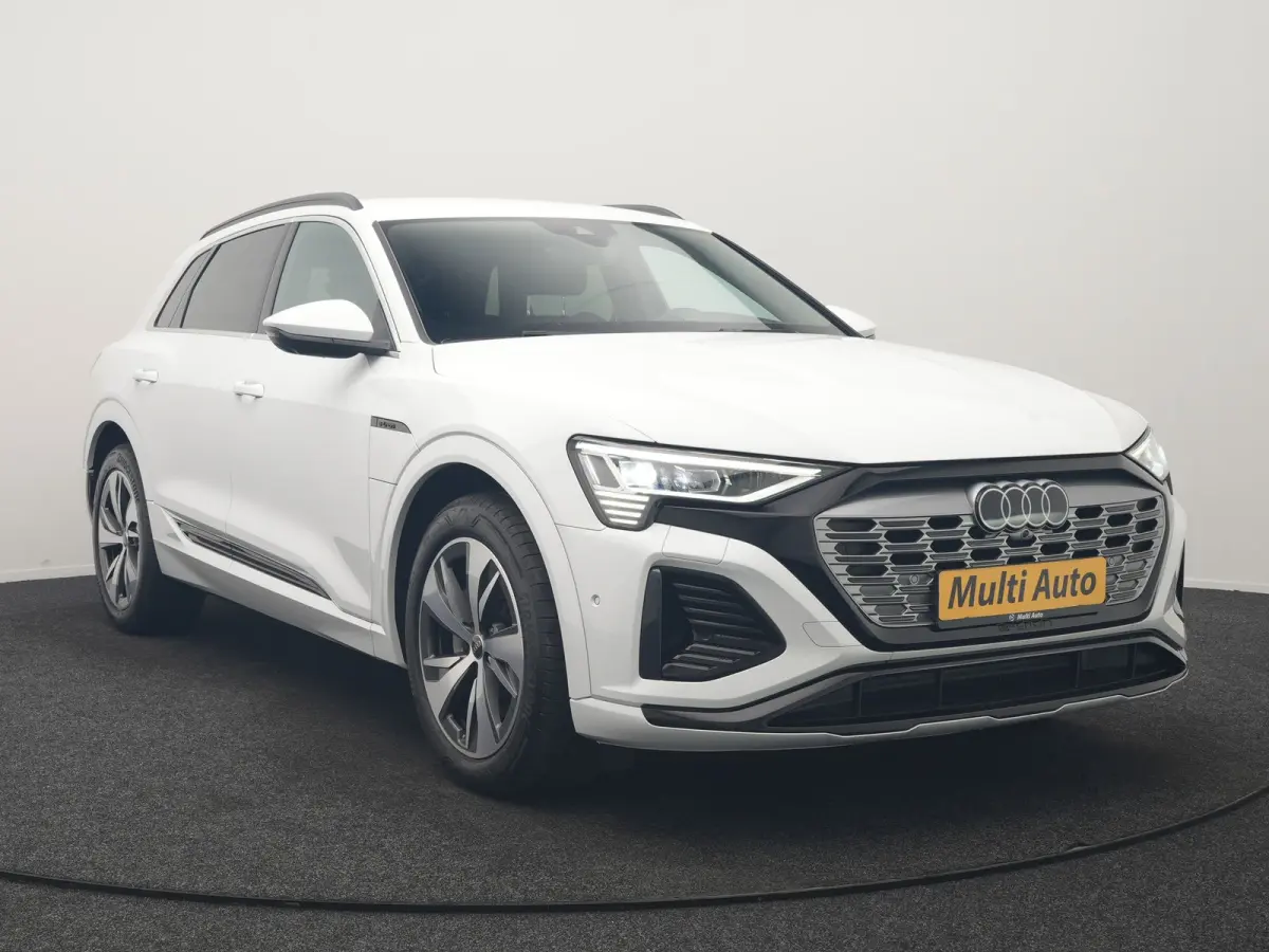 55 quattro S Line 114 kWh Dealer O.H | Trekhaak Afn. | Luchtvering | 360 Camera | Head Up | Adaptive Cruise | Matrix LED | Alcantara Sportstoelen Verwarmd | Apple Carplay | Keyless | Blis | 