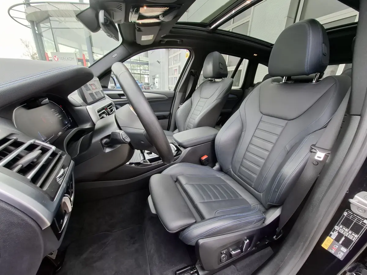 High Executive M-sport 80 kWh | SoH 96.6% | Navigatie/Android/Apple Carplay | LM Velgen 20" | Elektrisch Panoramadak | Stuur/Voorstoelen Verwarmd | ADC | Elektrische Trekhaak | Airco |