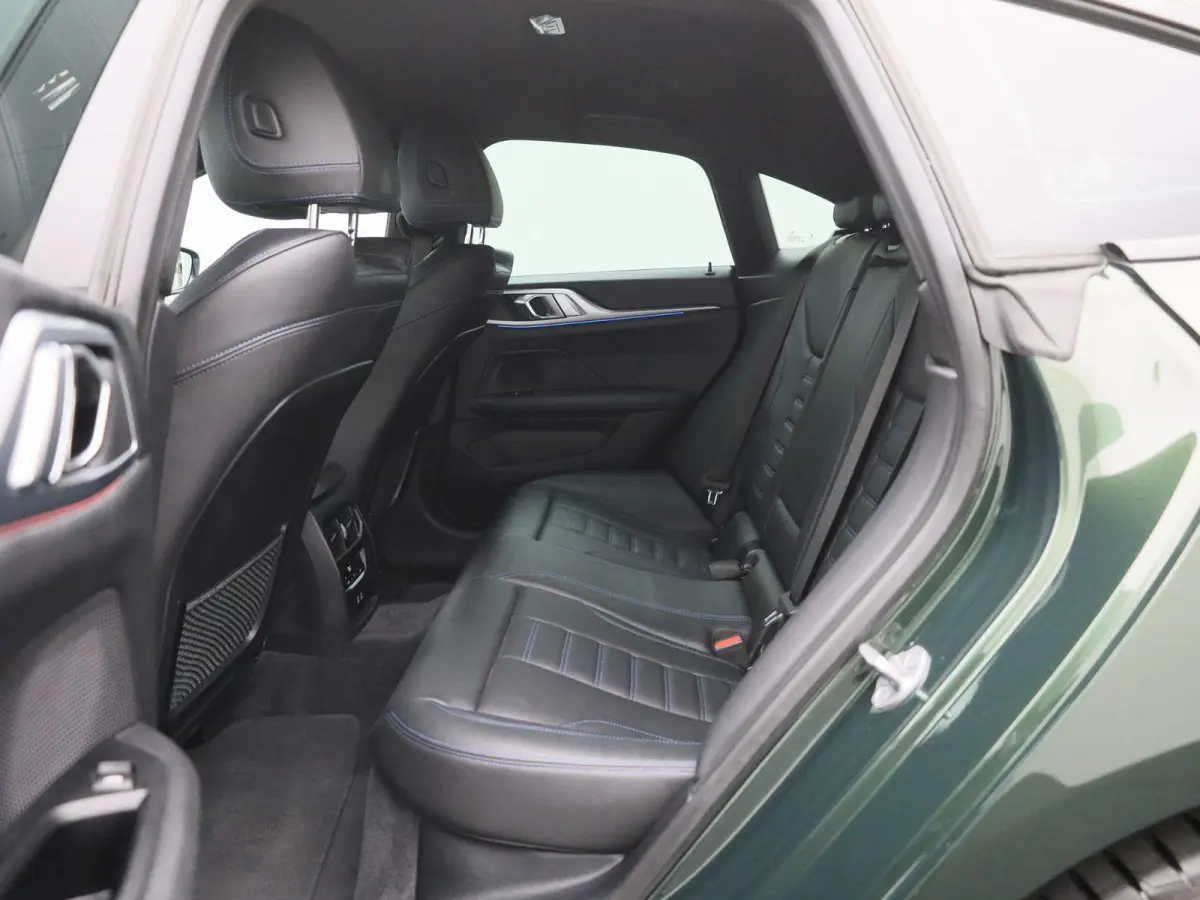 eDrive40 High Executive 84 kWh | ACHTERUITRIJCAMERA | HEAD-UP | ELEKTRISCHE KOFFERKLEP | STOELVERWARMING | APPLE CARPLAY - ANDROID AUTO | ADAPTIVE CRUISE CONTROL |