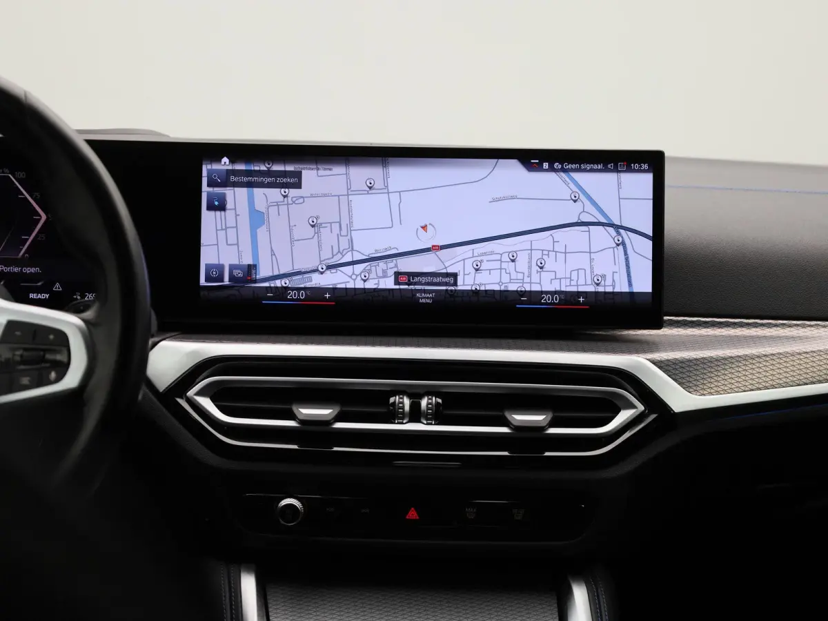 eDrive40 High Executive 84 kWh | ACHTERUITRIJCAMERA | HEAD-UP | ELEKTRISCHE KOFFERKLEP | STOELVERWARMING | APPLE CARPLAY - ANDROID AUTO | ADAPTIVE CRUISE CONTROL |