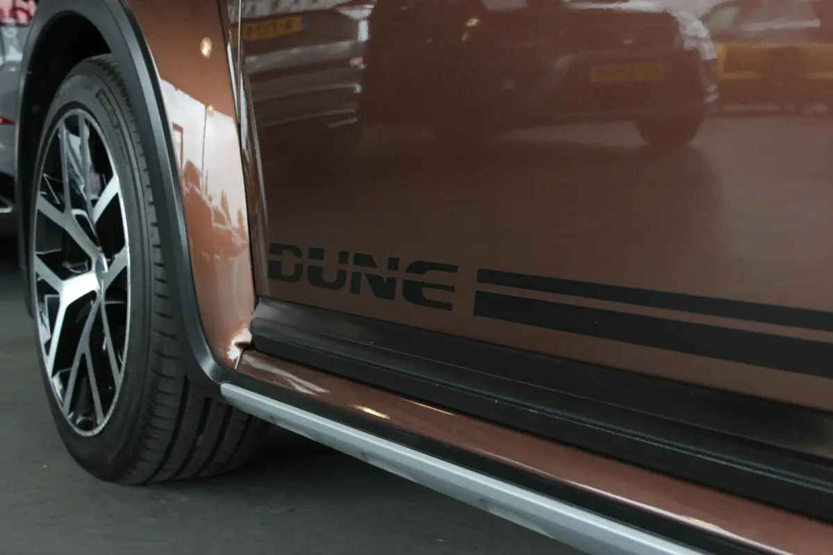 1.2 TSI Dune Carplay | Stoelverw. | Clima | Bluetooth | Cruise | Halfleder | 18" LMV | PDC V+A