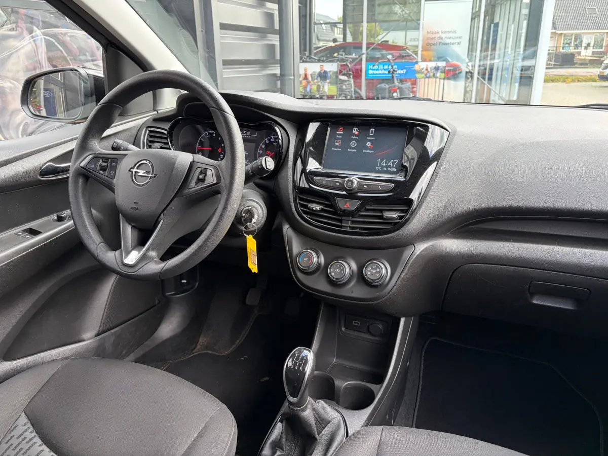1.0 75 PK Online Edition | NAVIGATIE + APPLE CARPLAY/ANDROID AUTO| PARKEERSENSOREN ACHTER| DAB| GETINT GLAS| AIRCO| CRUISE CONTROL| MISTLAMPEN VOOR| 15"LM-VELGEN| NL-AUTO|
