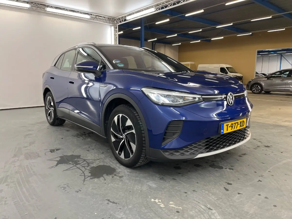 Pro 77 kWh | Navi | Parkeersensoren | Stoelverwarming | Apple Carplay/Android Auto | Afwijkende dakkleur | Airco (automatisch) | Apple Carplay/Android Auto|telefoonintegratie premium