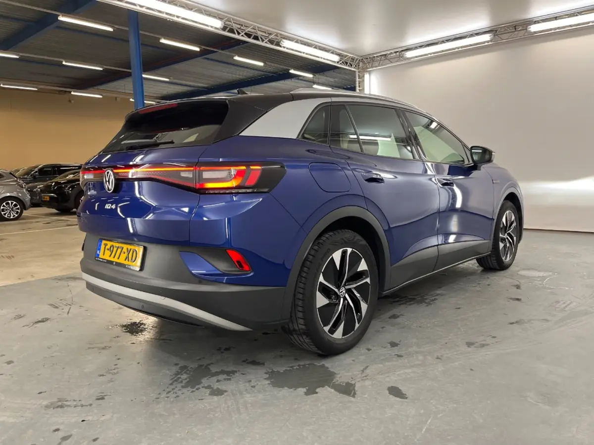 Pro 77 kWh | Navi | Parkeersensoren | Stoelverwarming | Apple Carplay/Android Auto | Afwijkende dakkleur | Airco (automatisch) | Apple Carplay/Android Auto|telefoonintegratie premium