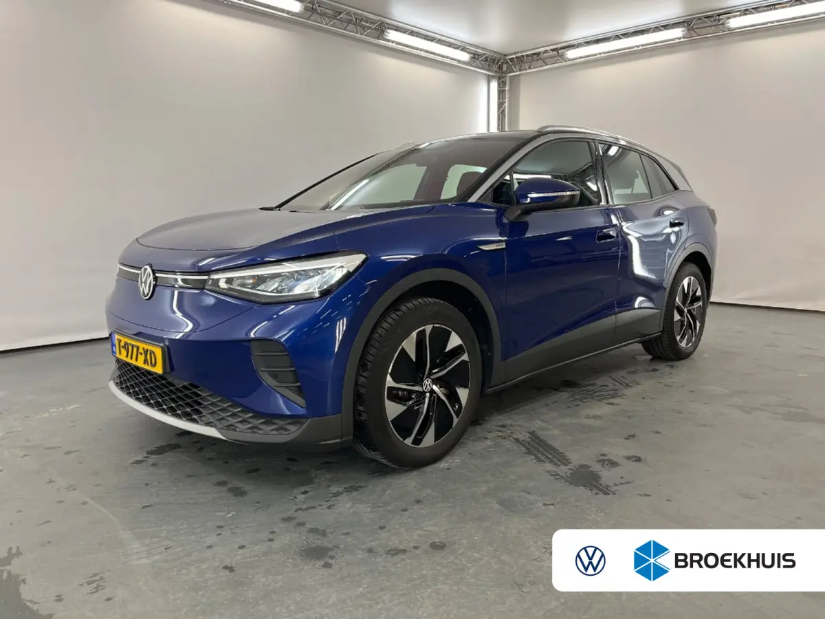 Pro 77 kWh | Navi | Parkeersensoren | Stoelverwarming | Apple Carplay/Android Auto | Afwijkende dakkleur | Airco (automatisch) | Apple Carplay/Android Auto|telefoonintegratie premium