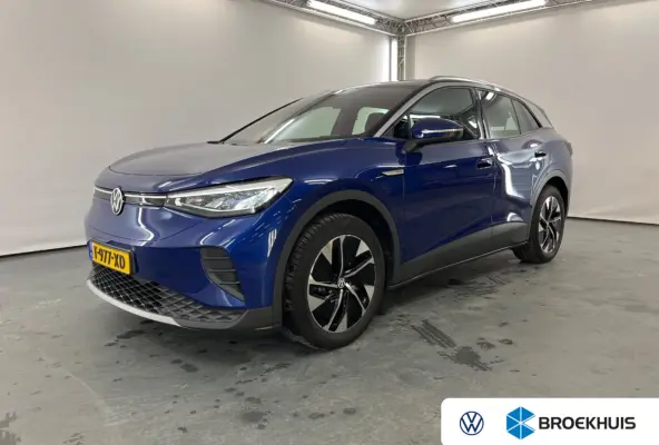 Pro 77 kWh | Navi | Parkeersensoren | Stoelverwarming | Apple Carplay/Android Auto | Afwijkende dakkleur | Airco (automatisch) | Apple Carplay/Android Auto|telefoonintegratie premium