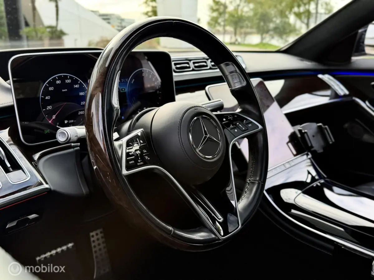 580 e 4MATIC Lang AMG Line|chauffeurspakket|pano|tv schermen|drive pilot