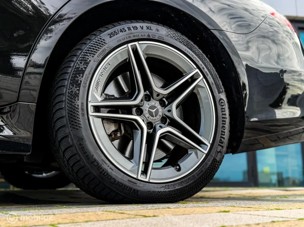 580 e 4MATIC Lang AMG Line|chauffeurspakket|pano|tv schermen|drive pilot
