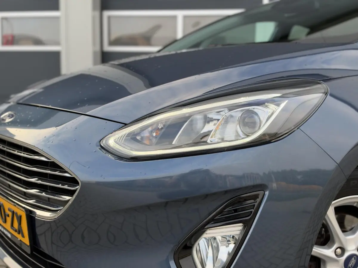 1.0 EcoBoost Titanium | LED | CarPlay | Navigatie | Cruise | Climate | Lichtmetaal | Sensoren