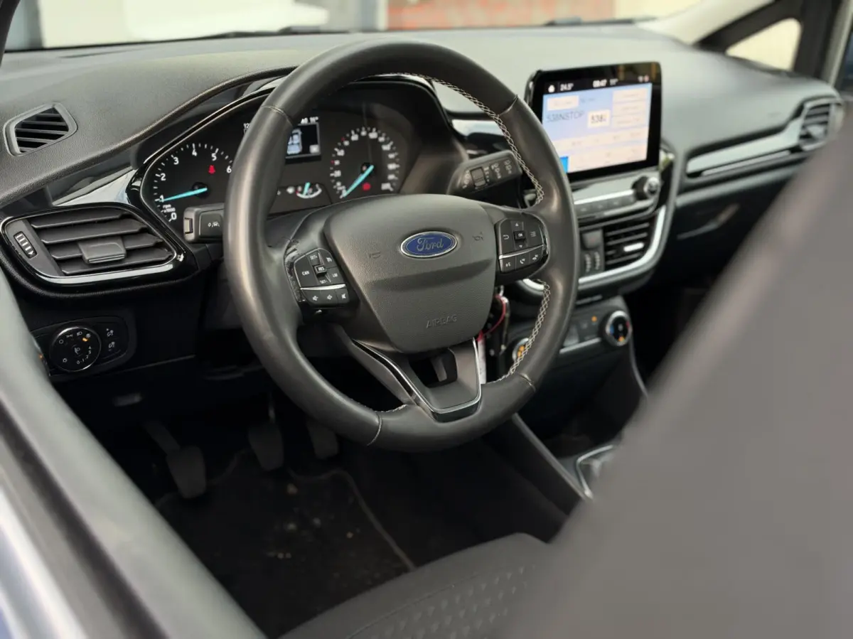 1.0 EcoBoost Titanium | LED | CarPlay | Navigatie | Cruise | Climate | Lichtmetaal | Sensoren