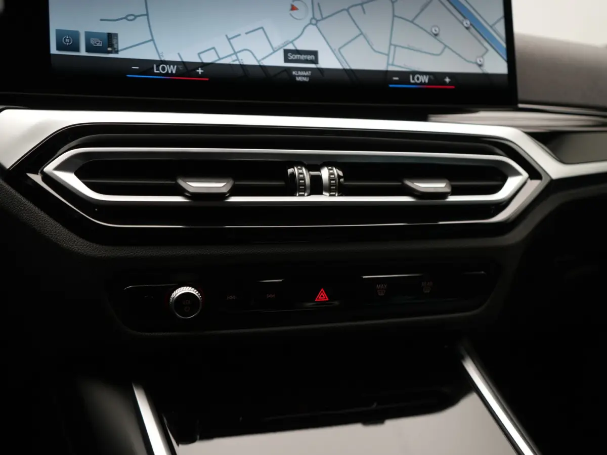 eDrive 35 70 kWh 286pk Dealer O.H | SOH 96,3% | Adaptive Cruise | Camera | Lederen Sportstoelen Verwarmd | Apple Carplay | Keyless | Navigatie | Virtual | DAB | 18"L.M |