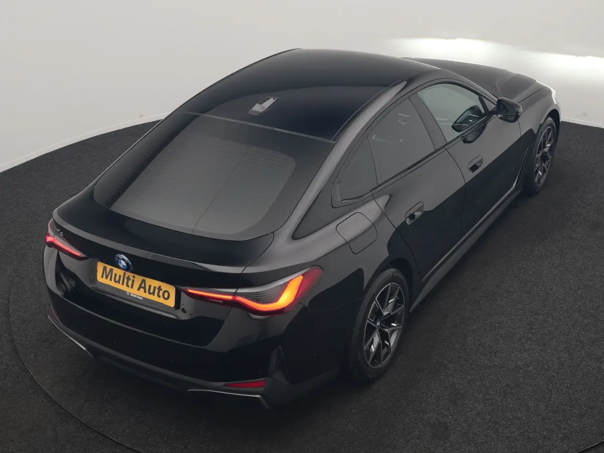 eDrive 35 70 kWh 286pk Dealer O.H | SOH 96,3% | Adaptive Cruise | Camera | Lederen Sportstoelen Verwarmd | Apple Carplay | Keyless | Navigatie | Virtual | DAB | 18"L.M |