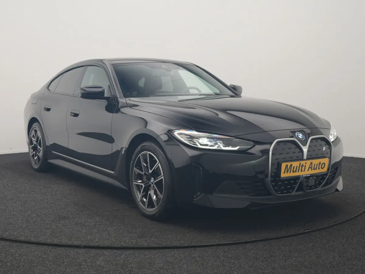 eDrive 35 70 kWh 286pk Dealer O.H | SOH 96,3% | Adaptive Cruise | Camera | Lederen Sportstoelen Verwarmd | Apple Carplay | Keyless | Navigatie | Virtual | DAB | 18"L.M |