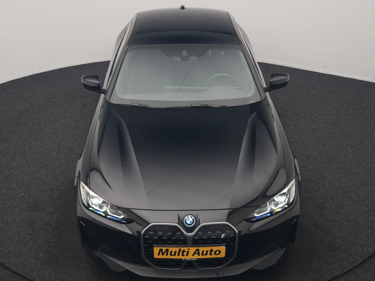 eDrive 35 70 kWh 286pk Dealer O.H | SOH 96,3% | Adaptive Cruise | Camera | Lederen Sportstoelen Verwarmd | Apple Carplay | Keyless | Navigatie | Virtual | DAB | 18"L.M |