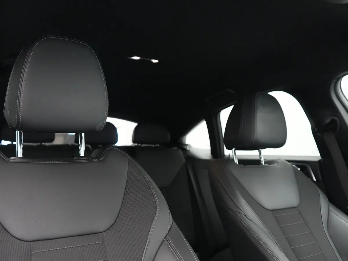 eDrive 35 70 kWh 286pk Dealer O.H | SOH 96,3% | Adaptive Cruise | Camera | Lederen Sportstoelen Verwarmd | Apple Carplay | Keyless | Navigatie | Virtual | DAB | 18"L.M |