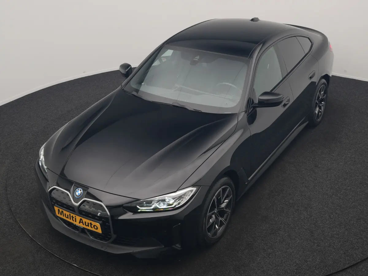 eDrive 35 70 kWh 286pk Dealer O.H | SOH 96,3% | Adaptive Cruise | Camera | Lederen Sportstoelen Verwarmd | Apple Carplay | Keyless | Navigatie | Virtual | DAB | 18"L.M |