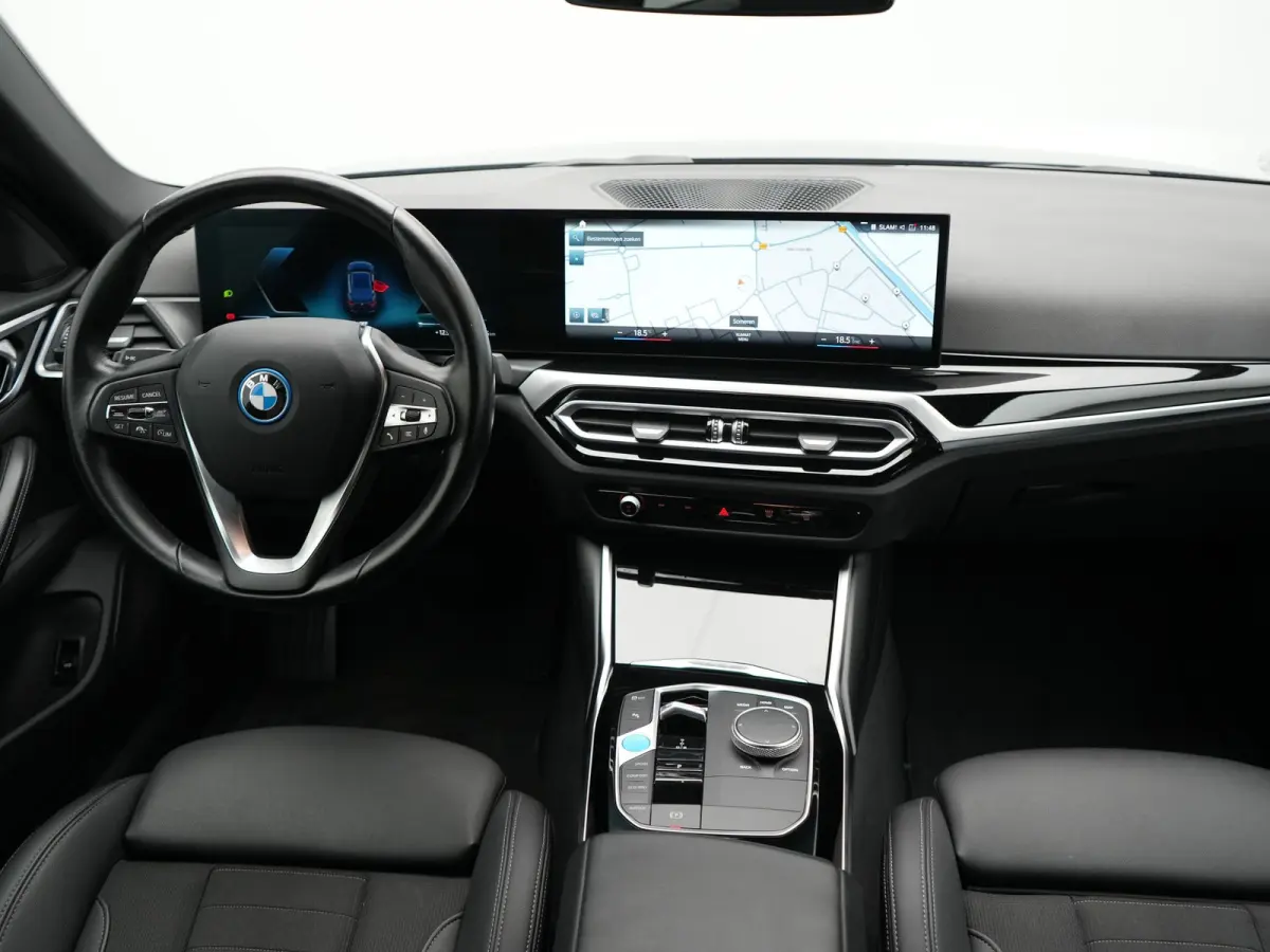 eDrive 35 70 kWh 286pk Dealer O.H | SOH 96,3% | Adaptive Cruise | Camera | Lederen Sportstoelen Verwarmd | Apple Carplay | Keyless | Navigatie | Virtual | DAB | 18"L.M |