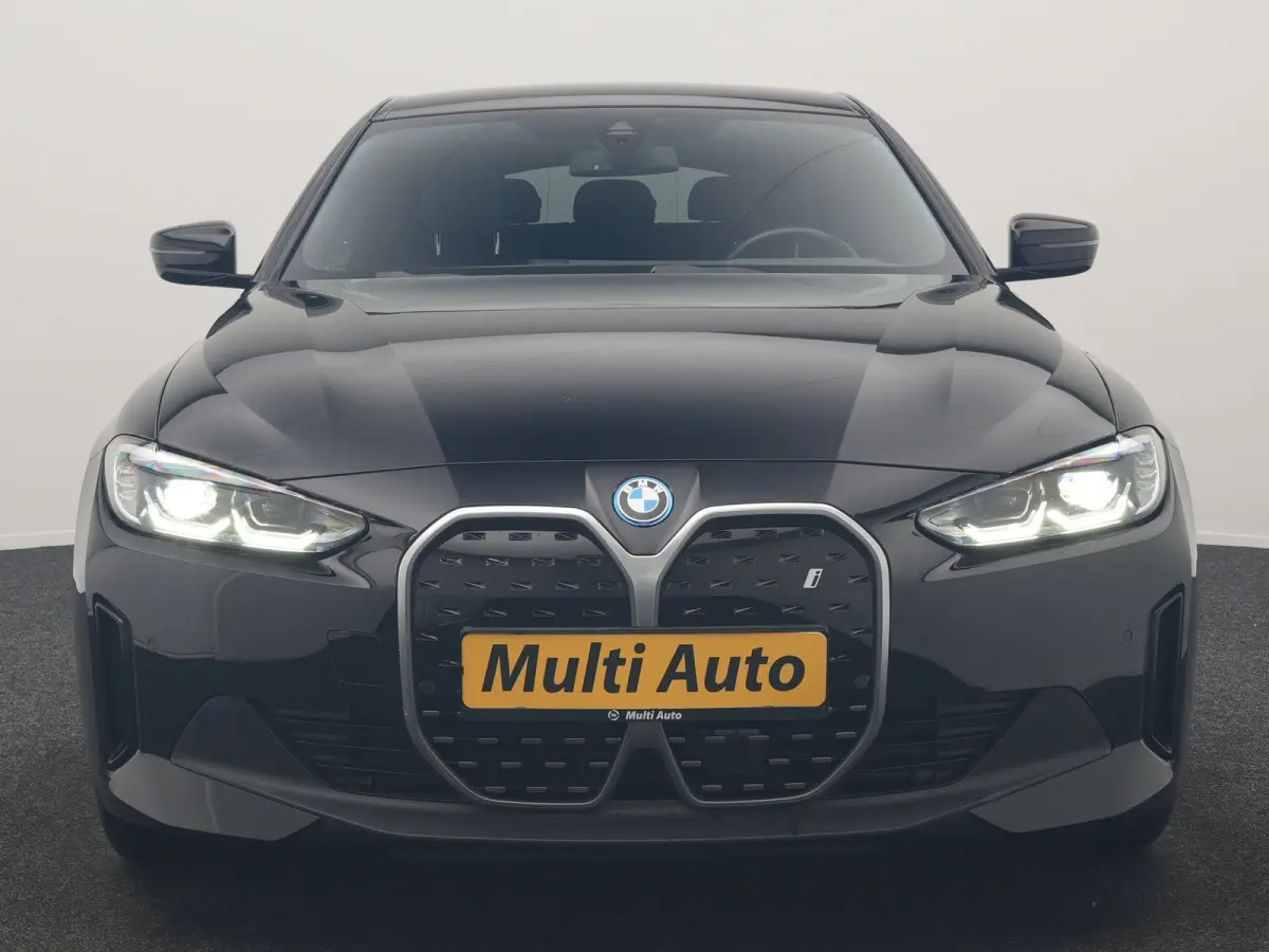 eDrive 35 70 kWh 286pk Dealer O.H | SOH 96,3% | Adaptive Cruise | Camera | Lederen Sportstoelen Verwarmd | Apple Carplay | Keyless | Navigatie | Virtual | DAB | 18"L.M |