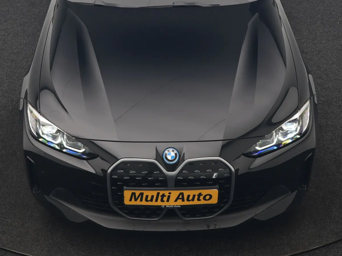 eDrive 35 70 kWh 286pk Dealer O.H | SOH 96,3% | Adaptive Cruise | Camera | Lederen Sportstoelen Verwarmd | Apple Carplay | Keyless | Navigatie | Virtual | DAB | 18"L.M |