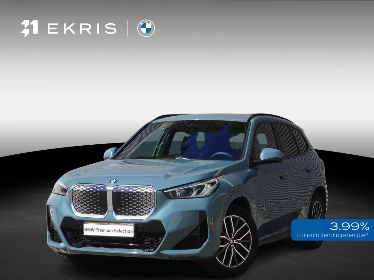 eDrive20 | SoH 100% | M Sportpakket | Getinte ramen | 18 inch LM-Velgen | Achteruitrijcamera | Actiefstoelen voor | Elektrisch verwarmde voorstoelen