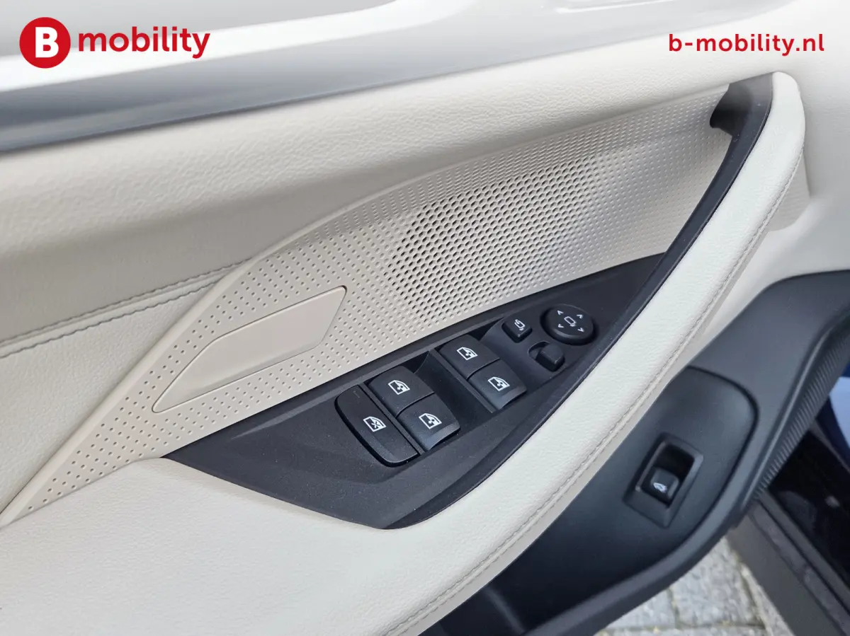 M50 High Executive M-Sport 84 kWh 'Tansanitblau' SOH 96% NL Auto! | 360 Camera | Hifi | DAB | Snelladen | Leer | Head-Up